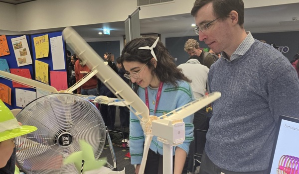 Dr Markella Zormpa and Professor Chris Vogel on the Turning Turbines stand at Oxford Brookes Science Bazaar